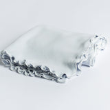 Want to add some colors to your child’s life? Our receiving blanket comes in a variety of colors and in many combinations. Known as the best swaddle blanket in soft cotton that gets softer with every washBlue- white. The ribbon makes great gift presentation!